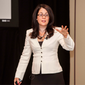 suzannah-baum-speaking-on-stage